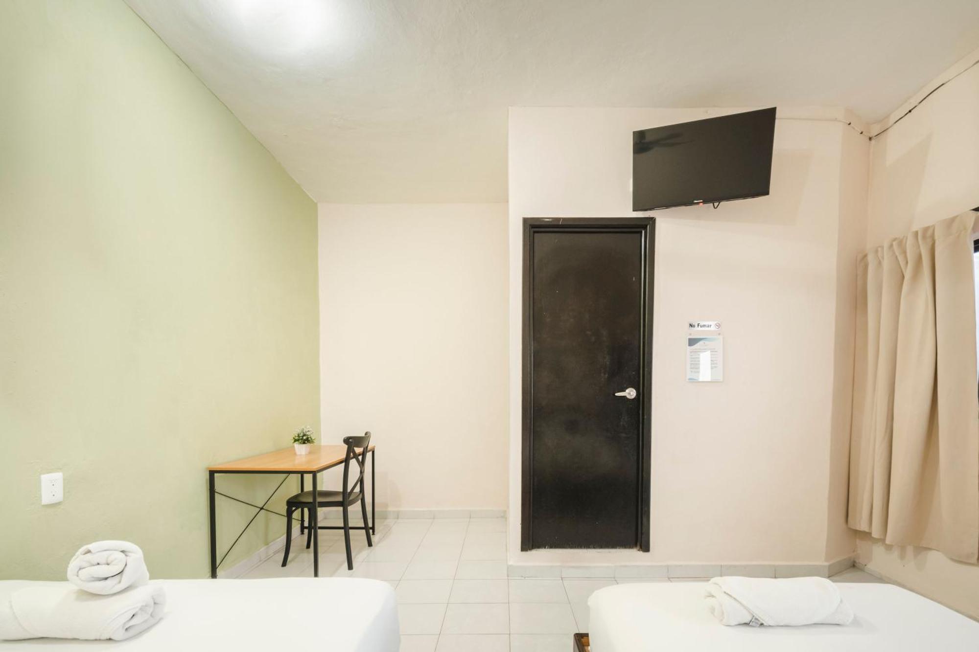 Hotel Quiam Плая-дель-Кармен Экстерьер фото