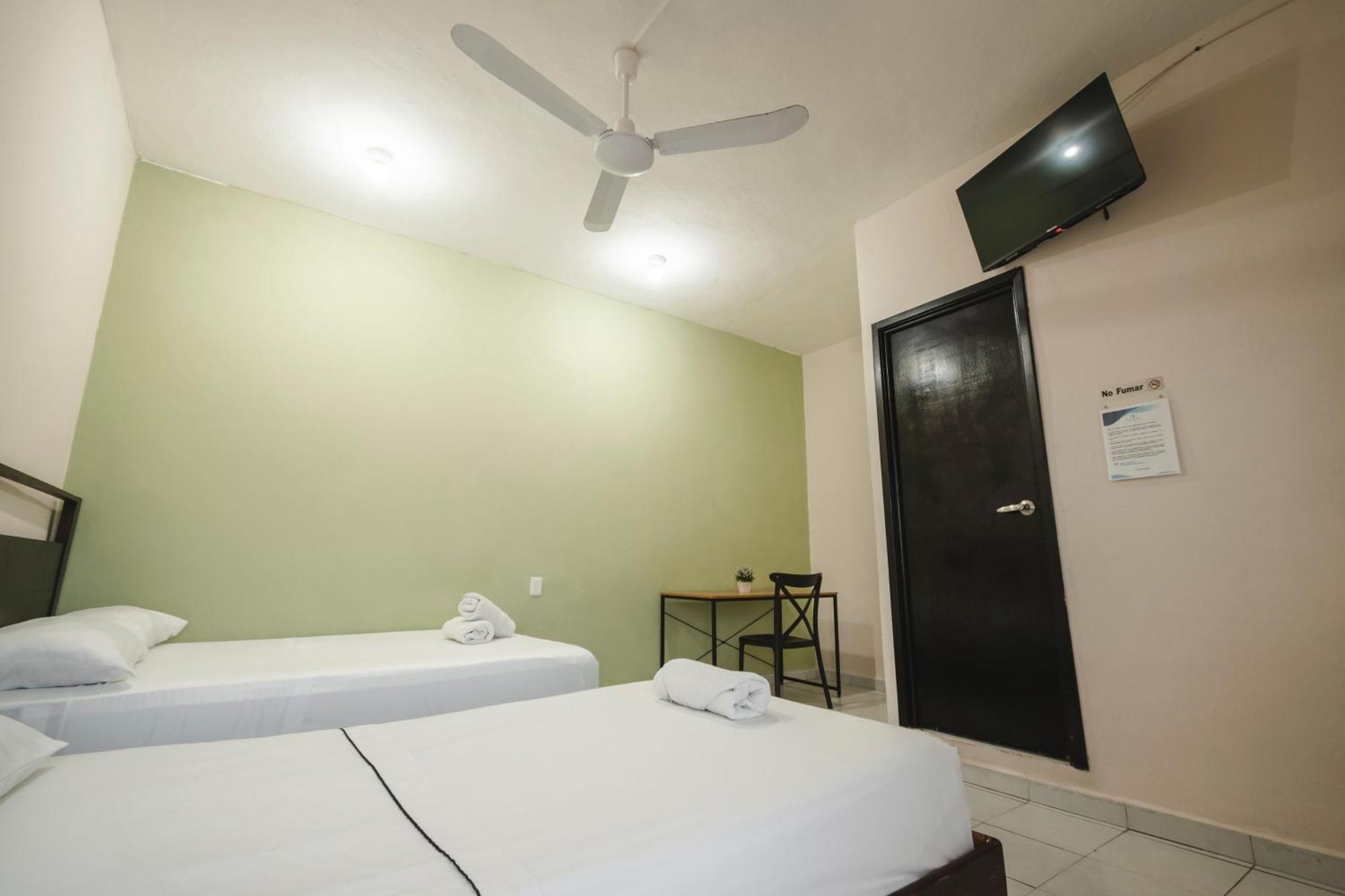 Hotel Quiam Плая-дель-Кармен Экстерьер фото
